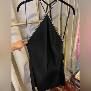 Mac Duggal black mini dress with rhinestone embellishment.